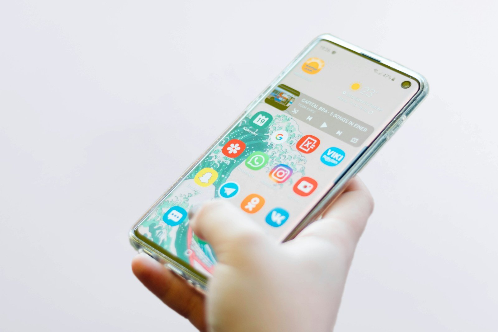 Person using a smartphone to message a business