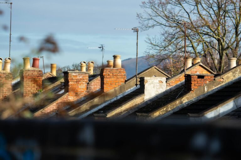 Row of chimneys on brick houses in the UK